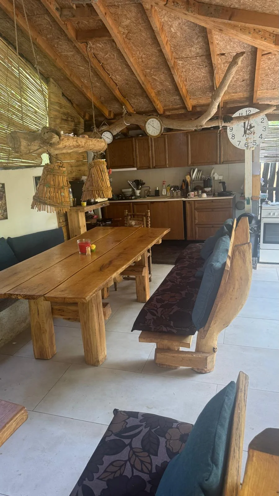 Rustic outdoor kitchen and large dining table